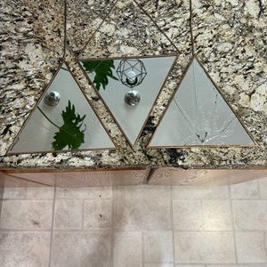 3 gold frame triangle mirrors